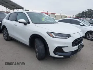 2023 Honda HR-V EX-L with VIN 3CZRZ1H7XPM724137, listed as a IAAI auction lot 42141009 with 35,098 mi miles and . Bid and sale history available at DreamBid. Image 1.