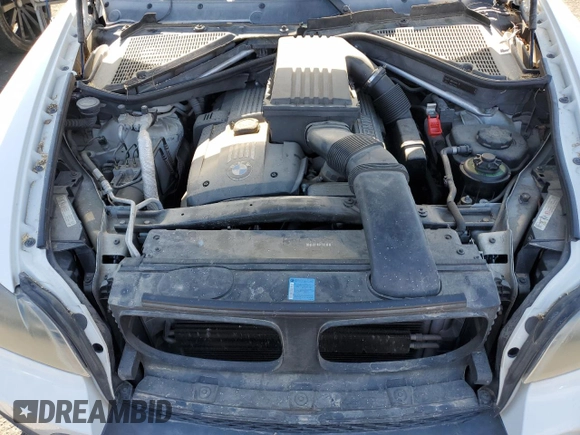 2007 BMW X5 3.0si with VIN 5UXFE43577L018075, listed as a Copart auction lot 81005304 with 128,100 mi miles and Salvage Title. Bid and sale history available at carsss.com. Image 12.