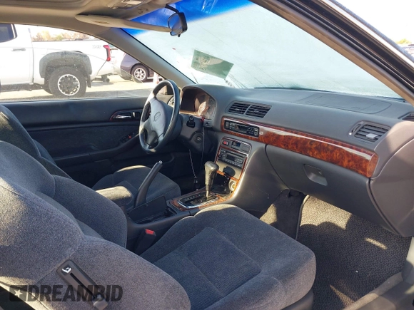 1998 Acura CL z VIN 19UYA3245WL000750, wystawiony jako IAAI lot #41987675 z przebiegiem 212 914 mil mil oraz . Historia ofert i sprzedaży dostępna na DreamBid. Obrazek 5.