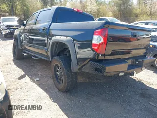 2014 Toyota Tundra 4WD Truck SR5 with VIN 5TFDW5F15EX337114, listed as a IAAI auction lot 41734727 with 209,163 mi miles. Bid and sale history available at carsss.com. Image 3.