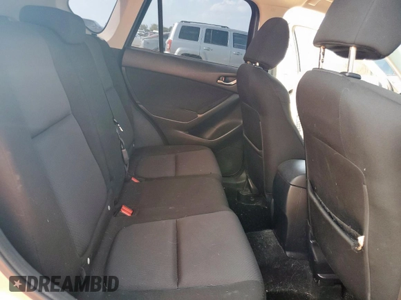 2013 Mazda CX-5 Sport with VIN JM3KE2BE5D0129797, listed as a Copart auction lot 58051185 with 200,712 mi miles and Salvage title. Bid and sale history available at DreamBid. Image 11.