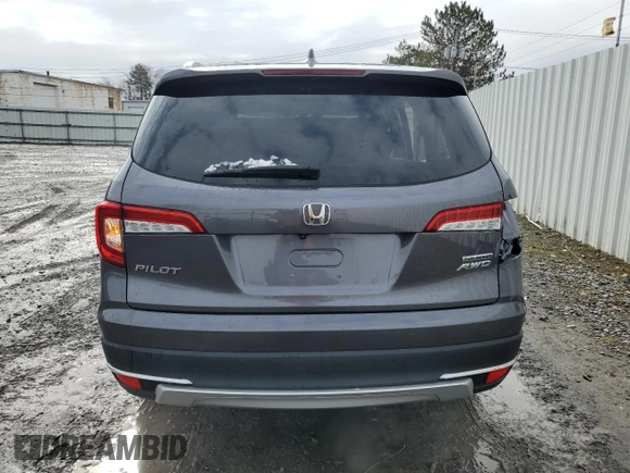 2020 Honda Pilot Touring 7-Passenger with VIN 5FNYF6H60LB039609, listed as a Copart auction lot 51753425 with 57,512 mi miles and Salvage title. Bid and sale history available at DreamBid. Image 6.