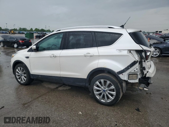 2018 Ford Escape Titanium z VIN 1FMCU9J94JUB49827, wystawiony jako Copart lot #55697385 z przebiegiem 98 682 mil mil oraz Szkoda całkowita • Salvage title. Historia ofert i sprzedaży dostępna na DreamBid. Obrazek 2.