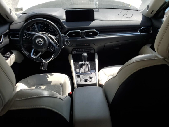 2021 Mazda CX-5 Grand Touring with VIN JM3KFBDM3M1305807, listed as a Copart auction lot 42713655 with 58,162 mi miles and Salvage Title. Bid and sale history available at DreamBid. Image 8.