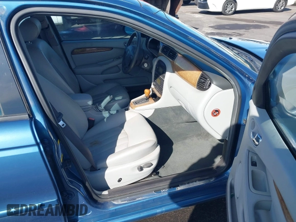 2002 Jaguar X-Type with VIN SAJEA51C42WC11103, listed as a IAAI auction lot 41699366 with 106,418 mi miles and . Bid and sale history available at DreamBid. Image 5.