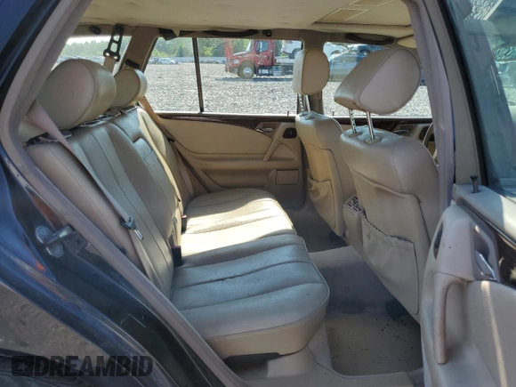 1999 Mercedes-Benz E-Class with VIN WDBJH82F8XX020574, listed as a Copart auction lot 63730124 with 201,401 mi miles and Salvage Title. Bid and sale history available at carsss.com. Image 11.