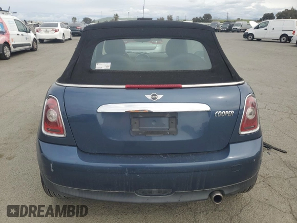 2010 MINI Convertible with VIN WMWMR3C52ATU98506, listed as a Copart auction lot 47706195 with 92,804 mi miles and Clean Title. Bid and sale history available at DreamBid. Image 6.