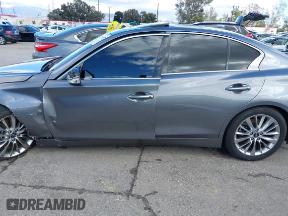 2019 Infiniti Q50 Luxe z VIN JN1EV7APXKM512617, wystawiony jako IAAI lot #41517907 z przebiegiem 46 619 mil mil oraz . Historia ofert i sprzedaży dostępna na DreamBid. Obrazek 14.