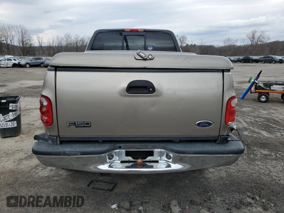 2002 Ford F-150 XL with VIN 1FTRX08L12KA41875, listed as a Copart auction lot 64756525 with 221,793 mi miles and Non repairable. Bid and sale history available at DreamBid. Image 6.