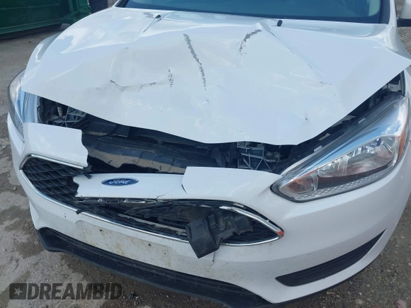2016 Ford Focus SE z VIN 1FADP3F29GL346196, wystawiony jako IAAI lot #42171014 z przebiegiem 80 913 mil mil oraz . Historia ofert i sprzedaży dostępna na DreamBid. Obrazek 6.