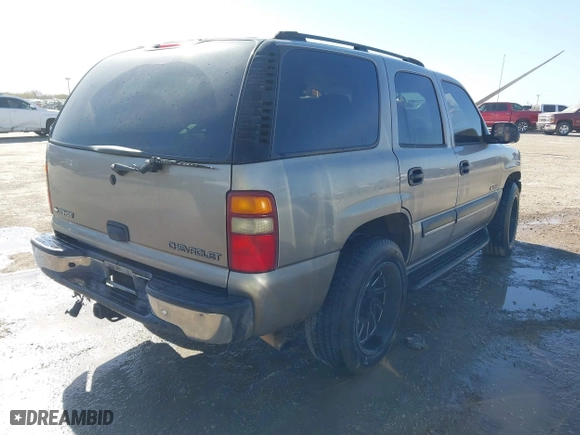 2003 Chevrolet Tahoe LS with VIN 1GNEC13V03R302664, listed as a IAAI auction lot 41772648 with 270,634 mi miles. Bid and sale history available at carsss.com. Image 4.