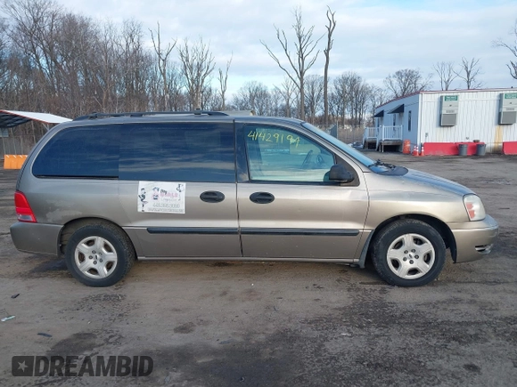2005 Ford Freestar SE z VIN 2FMZA51645BA05742, wystawiony jako IAAI lot #41429194 z przebiegiem 145 415 mil mil oraz . Historia ofert i sprzedaży dostępna na DreamBid. Obrazek 13.