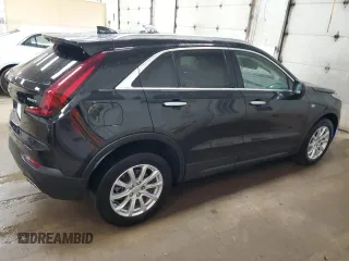 2022 Cadillac XT4 AWD Luxury with VIN 1GYFZBR45NF145986, listed as a Copart auction lot 79198274 with 23,477 mi miles and Salvage Title. Bid and sale history available at carsss.com. Image 3.
