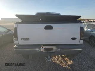 1999 Ford F-350 XL with VIN 1FTSW31F8XED52624, listed as a Copart auction lot 86359524 with 310,829 mi miles and Salvage title. Bid and sale history available at DreamBid. Image 6.
