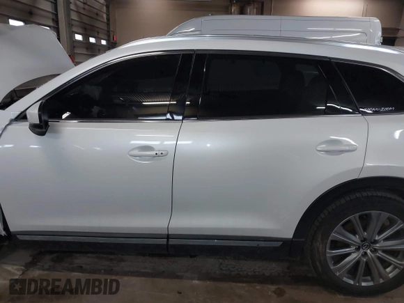 2021 Mazda CX-9 Signature with VIN JM3TCBEY3M0509978, listed as a IAAI auction lot 41690773 with 65,418 mi miles. Bid and sale history available at carsss.com. Image 14.