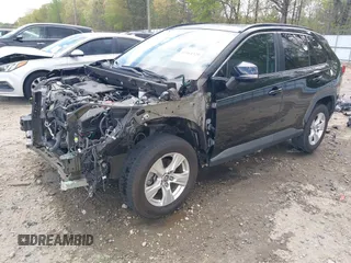 2019 Toyota RAV4 XLE with VIN 2T3W1RFV8KW001328, listed as a IAAI auction lot 41961320 with 100,678 mi miles and . Bid and sale history available at DreamBid. Image 18.