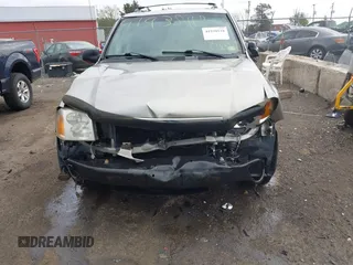 2003 GMC Envoy SLE with VIN 1GKDT13S932108979, listed as a IAAI auction lot 41938118 with 1 mi miles. Bid and sale history available at carsss.com. Image 6.