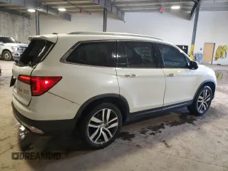 2017 Honda Pilot Elite with VIN 5FNYF6H08HB005758, listed as a Copart auction lot 53655725 with 124,218 mi miles and Salvage Title. Bid and sale history available at DreamBid. Image 3.