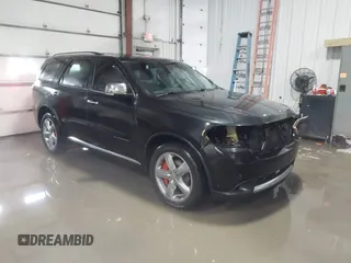 2012 Dodge Durango Citadel with VIN 1C4RDJEG8CC292006, listed as a IAAI auction lot 41553408 with 147,954 mi miles and . Bid and sale history available at DreamBid. Image 1.