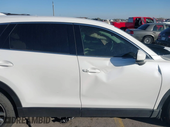 2018 Mazda CX-9 Touring with VIN JM3TCACY1J0216721, listed as a IAAI auction lot 41817553 with 77,669 mi miles. Bid and sale history available at carsss.com. Image 14.