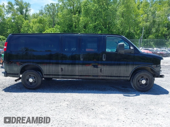 2018 Chevrolet Express Passenger LT with VIN 1GAZGPFG2J1320909, listed as a IAAI auction lot 42332001 with 89,732 mi miles and . Bid and sale history available at DreamBid. Image 14.