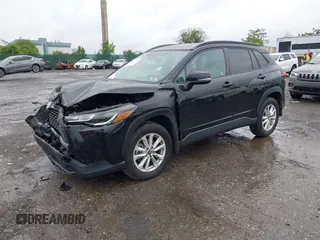 2022 Toyota Corolla Cross LE with VIN 7MUCAABG8NV004527, listed as a IAAI auction lot 42259519 with 15,211 mi miles and . Bid and sale history available at DreamBid. Image 16.