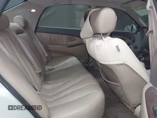 1999 Mitsubishi Diamante z VIN 6MMAP47P4XT003895, wystawiony jako IAAI lot #41992452 z przebiegiem 170 964 mil mil oraz . Historia ofert i sprzedaży dostępna na DreamBid. Obrazek 8.