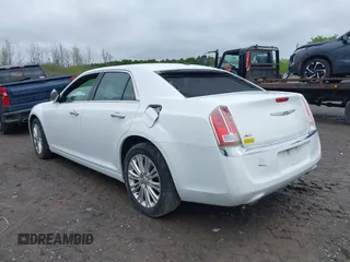 2014 Chrysler 300 C with VIN 2C3CCAKG5EH200996, listed as a IAAI auction lot 42201747 with 156,121 mi miles and . Bid and sale history available at carsss.com. Image 3.