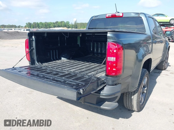 2018 Chevrolet Colorado 2WD LT with VIN 1GCGSCENXJ1129079, listed as a IAAI auction lot 42186317 with 84,872 mi miles and . Bid and sale history available at DreamBid. Image 18.