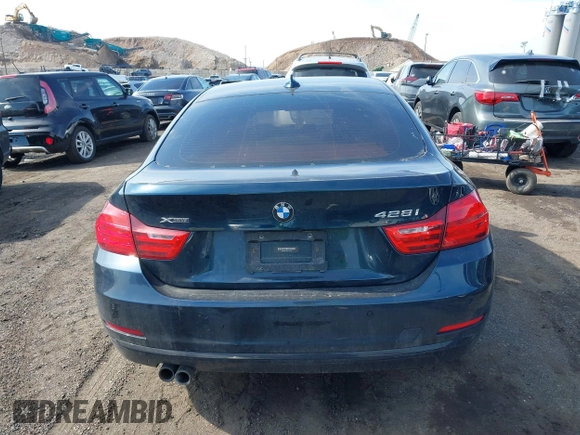 2016 BMW 4 Series 428i xDrive with VIN WBA4C9C56GG141089, listed as a IAAI auction lot 41587479 with 85,462 mi miles and . Bid and sale history available at DreamBid. Image 16.