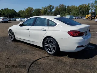 2020 BMW 4 Series 430i xDrive with VIN WBA4J3C01LCD21785, listed as a Copart auction lot 69656414 with 54,460 mi miles and Salvage title. Bid and sale history available at DreamBid. Image 2.