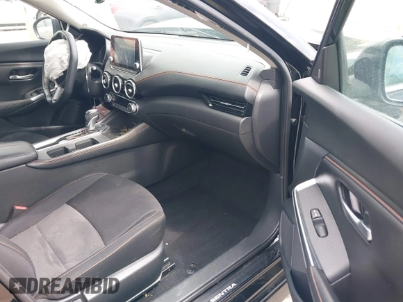 2022 Nissan Sentra SR z VIN 3N1AB8DV3NY295100, wystawiony jako IAAI lot #41901931 z przebiegiem 40 811 mil mil oraz . Historia ofert i sprzedaży dostępna na DreamBid. Obrazek 5.