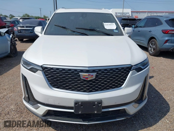 2023 Cadillac XT6 FWD Luxury z VIN 1GYKPAR4XPZ182533, wystawiony jako IAAI lot #42078937 z przebiegiem 31 248 mil mil oraz . Historia ofert i sprzedaży dostępna na DreamBid. Obrazek 6.