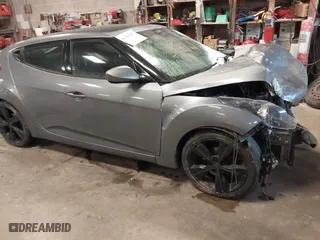 2016 Hyundai Veloster with VIN KMHTC6AD8GU267426, listed as a IAAI auction lot 41349385 with 114,245 mi miles. Bid and sale history available at carsss.com. Image 1.