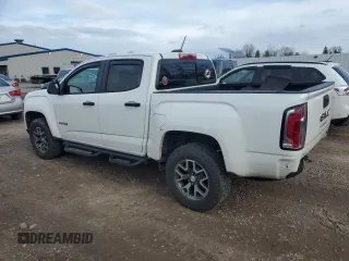 2021 GMC Canyon 4WD AT4 w/Leather with VIN 1GTG6FEN0M1100300, listed as a Copart auction lot 82281314 with 60,086 mi miles and Non Repairable. Bid and sale history available at carsss.com. Image 2.