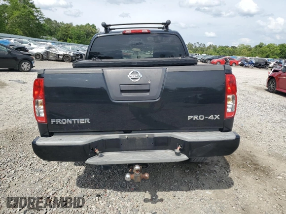 2012 Nissan Frontier Pro-4X z VIN 1N6AD0EV4CC405470, wystawiony jako Copart lot #54186715 z przebiegiem Nie podano mil oraz Szkoda całkowita • Salvage title. Historia ofert i sprzedaży dostępna na DreamBid. Obrazek 6.