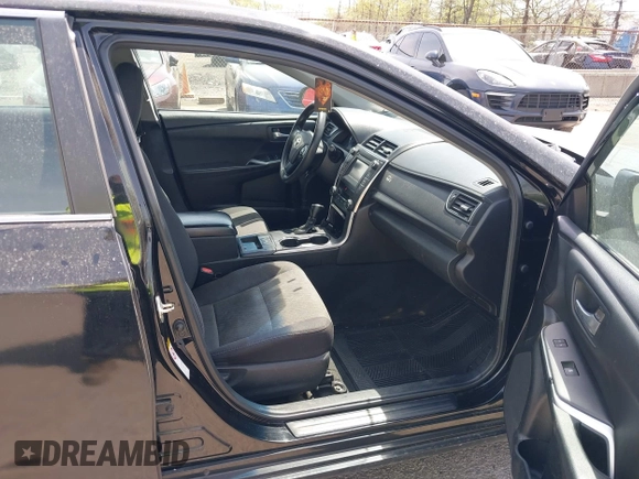 2015 Toyota Camry LE with VIN 4T1BD1FKXFU164963, listed as a IAAI auction lot 42132724 with 141,089 mi miles and . Bid and sale history available at DreamBid. Image 5.