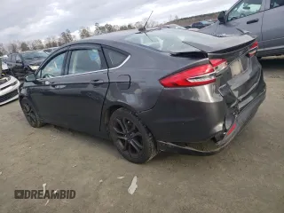 2018 Ford Fusion S z VIN 3FA6P0G70JR264965, wystawiony jako Copart lot #85553684 z przebiegiem 235 205 mil mil oraz Szkoda całkowita • Salvage title. Historia ofert i sprzedaży dostępna na DreamBid. Obrazek 2.