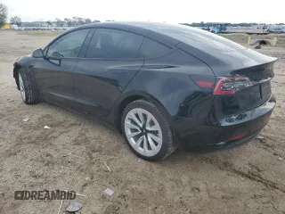 2022 Tesla Model 3 Long Range with VIN 5YJ3E1EB1NF243484, listed as a Copart auction lot 70745404 with 25,970 mi miles and Salvage Title. Bid and sale history available at DreamBid. Image 2.