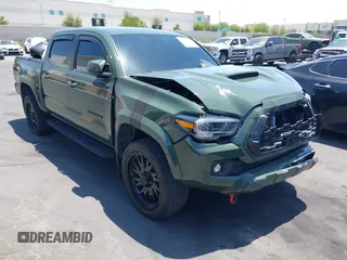 2022 Toyota Tacoma SR5 with VIN 3TMAZ5CN6NM174335, listed as a IAAI auction lot 42283420 with 54,601 mi miles and . Bid and sale history available at DreamBid. Image 1.