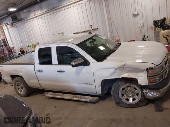 2014 Chevrolet Silverado 1500 Work Truck with VIN 1GCVKPEH5EZ249288, listed as a IAAI auction lot 41479579 with 141,549 mi miles and . Bid and sale history available at DreamBid. Image 13.