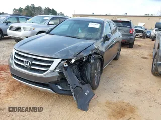 2014 Honda Crosstour EX-L z VIN 5J6TF2H59EL002739, wystawiony jako IAAI lot #41837819 z przebiegiem 139 361 mil mil oraz . Historia ofert i sprzedaży dostępna na DreamBid. Obrazek 17.