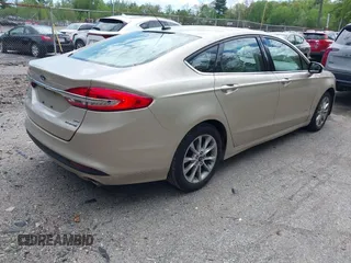 2017 Ford Fusion Hybrid SE с VIN 3FA6P0LU4HR301943, выставлен на аукционе IAAI как лот 42217709 с пробегом 102 791 миль миль и . История ставок и продаж доступна на DreamBid. Изображение 4.