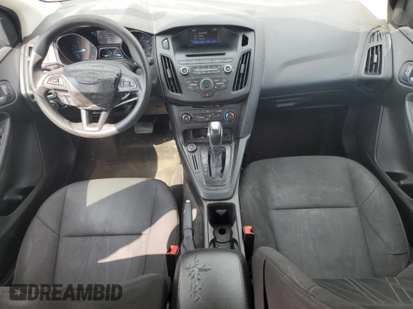 2016 Ford Focus SE z VIN 1FADP3F20GL281772, wystawiony jako Copart lot #59544365 z przebiegiem 166 189 mil mil oraz Czysty tytuł • Clean title. Historia ofert i sprzedaży dostępna na DreamBid. Obrazek 8.