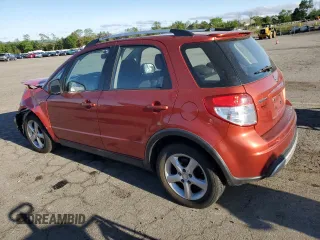 2009 Suzuki SX4 Touring AWD z VIN JS2YB417X96201551, wystawiony jako Copart lot #56630665 z przebiegiem 109 297 mil mil oraz Szkoda całkowita • Salvage title. Historia ofert i sprzedaży dostępna na DreamBid. Obrazek 2.