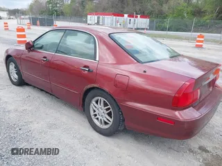 2000 Mitsubishi Diamante LS z VIN 6MMAP67P4YT003358, wystawiony jako IAAI lot #42112046 z przebiegiem 266 341 mil mil oraz . Historia ofert i sprzedaży dostępna na DreamBid. Obrazek 3.