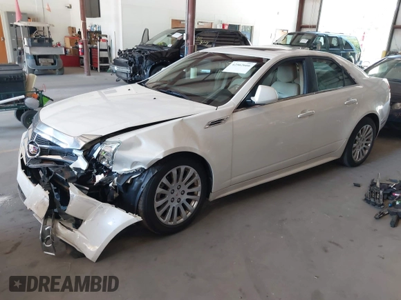 2010 Cadillac CTS Premium with VIN 1G6DS5EV8A0142811, listed as a IAAI auction lot 42562666 with 177,963 mi miles and . Bid and sale history available at DreamBid. Image 2.