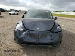 2024 Tesla Model Y с VIN 7SAYGDED4RA329638, выставлен на аукционе Copart как лот 54562525 с пробегом 8 606 миль миль и Списание • Salvage title. История ставок и продаж доступна на DreamBid. Изображение 5.
