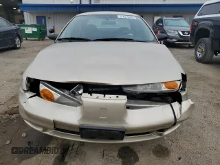 2002 Saturn SL z VIN 1G8ZH52892Z100073, wystawiony jako Copart lot #57023065 z przebiegiem 160 442 mil mil oraz Nie do naprawy. Historia ofert i sprzedaży dostępna na DreamBid. Obrazek 5.