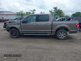2020 Ford F-150 XL with VIN 1FTEW1EP1LFC03447, listed as a IAAI auction lot 42626026 with 111,525 mi miles and . Bid and sale history available at DreamBid. Image 14.